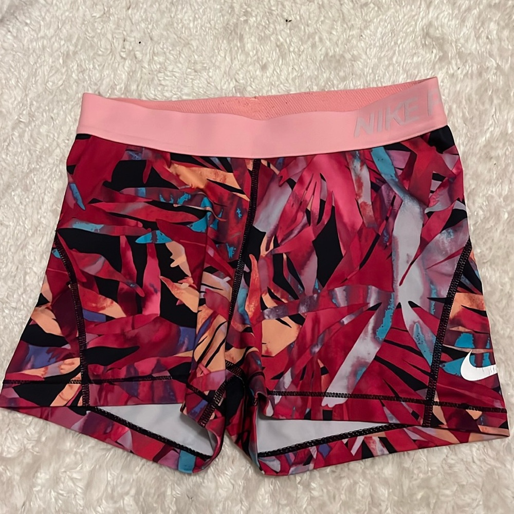 Pink and orange floral 3” Nike Pros, size: Medium